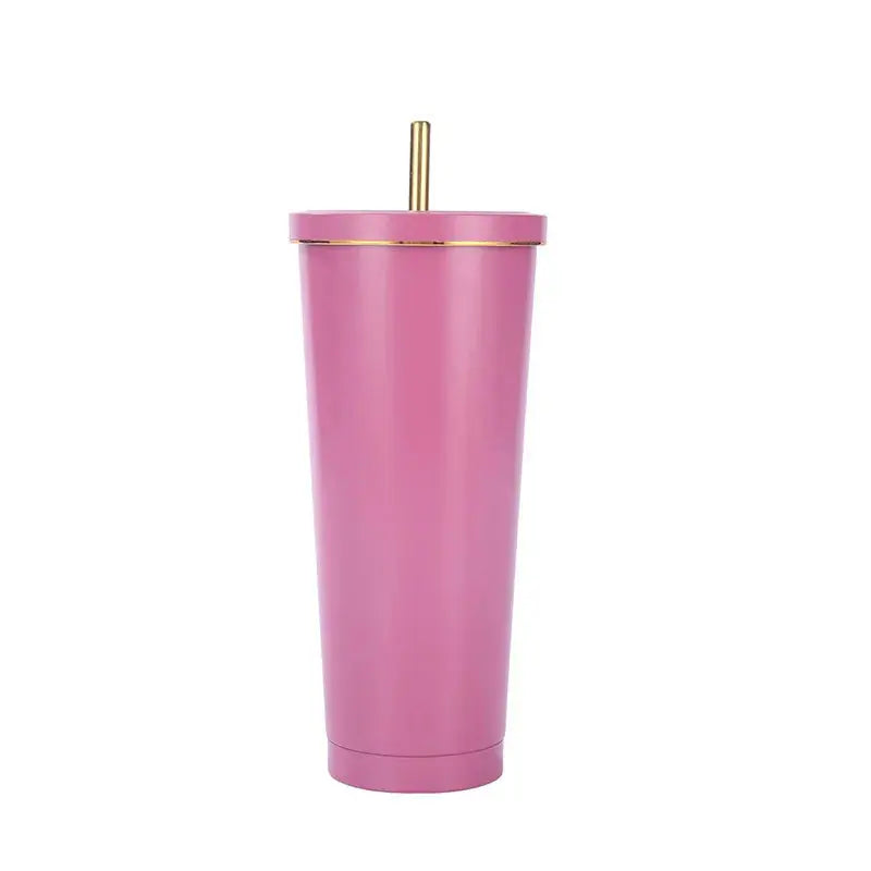Pink tumbler with a gold straw on a white background