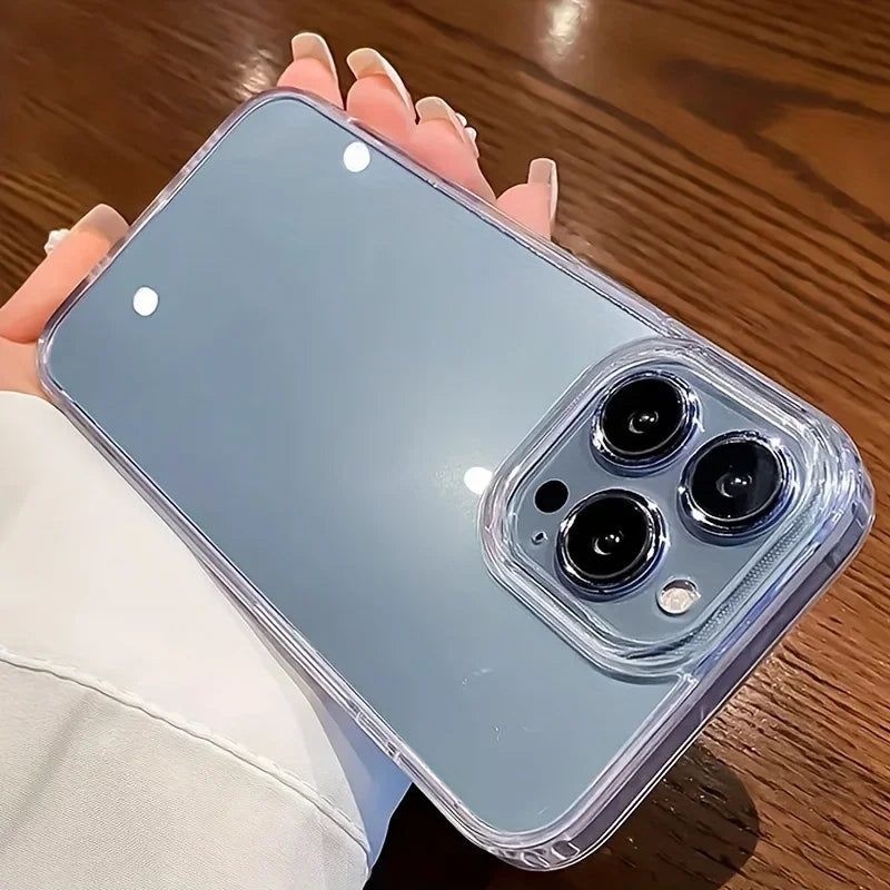 Phone case with camera lenses held by a person on a wooden surface