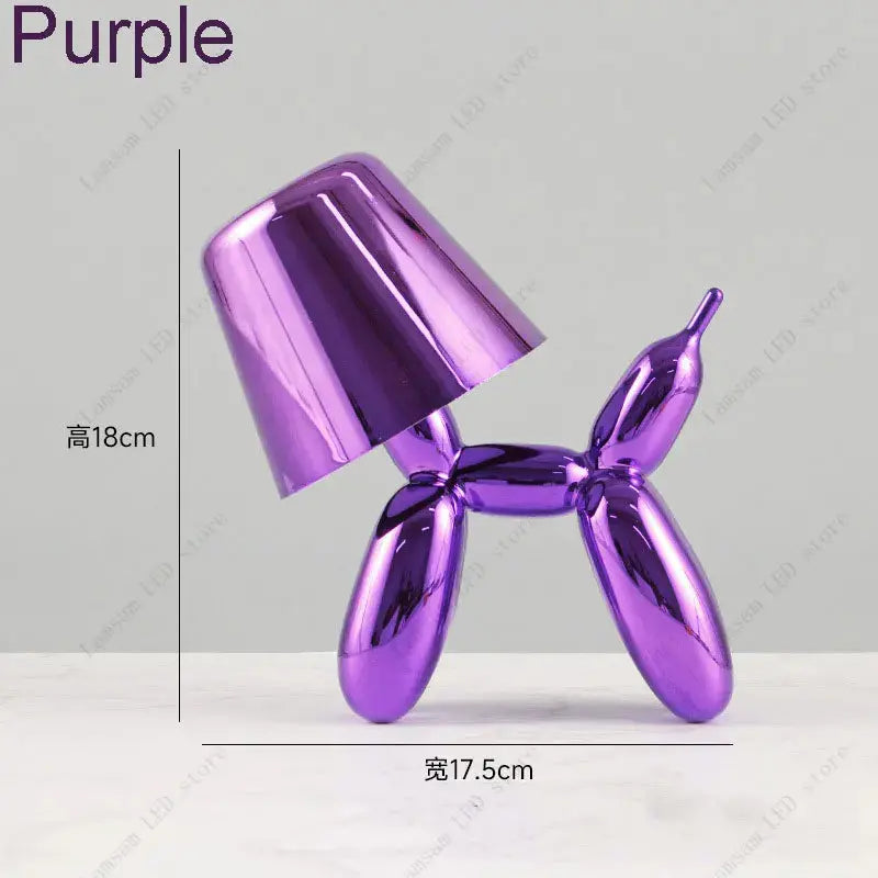 Purple metallic balloon dog sculpture with dimensions on a white background
