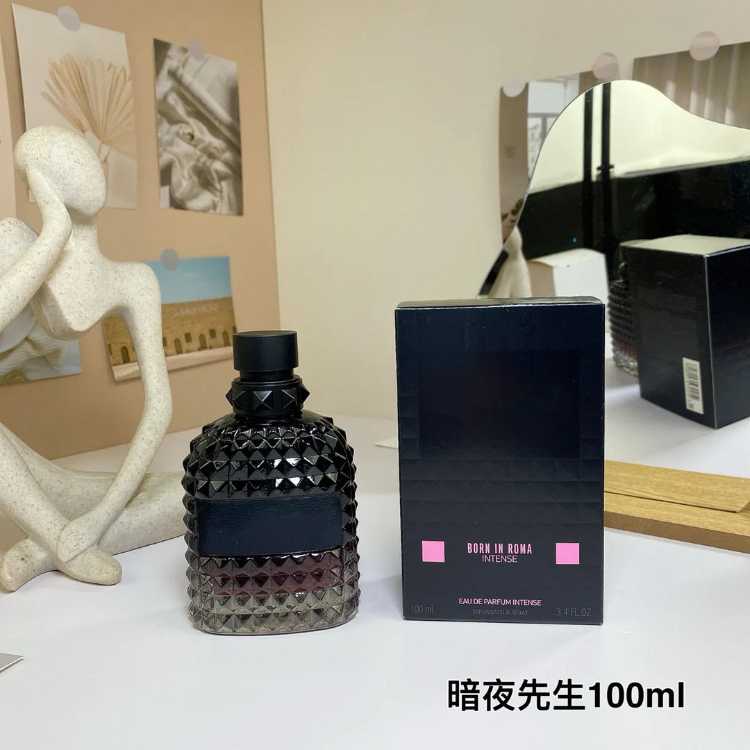 Valentino Perfume bottle and packaging on a table with decorative items in the background