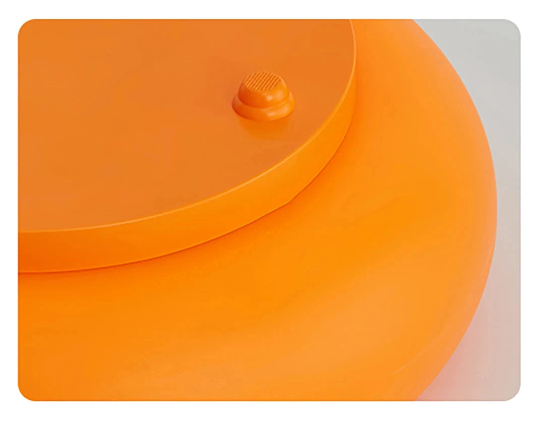 Orange silicone mat with a gray border on a white background