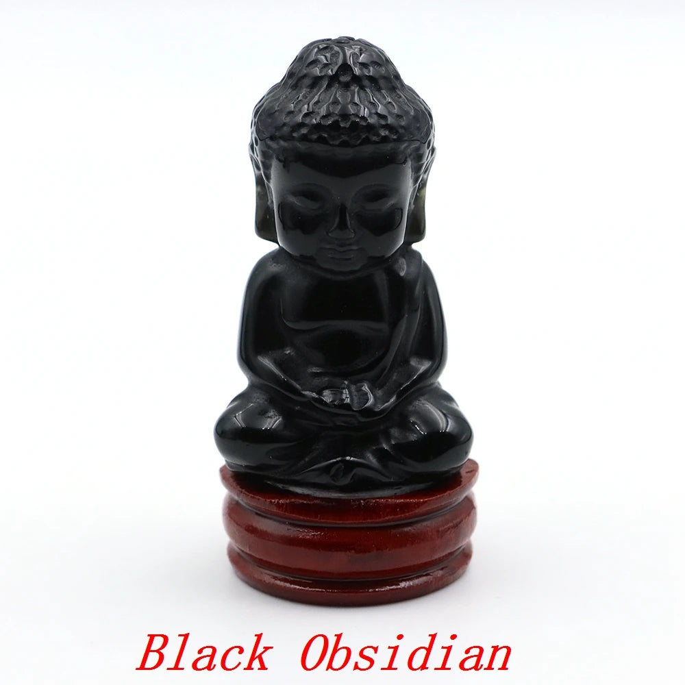 Black obsidian Buddha statue on a wooden stand with 'Black Obsidian' text.