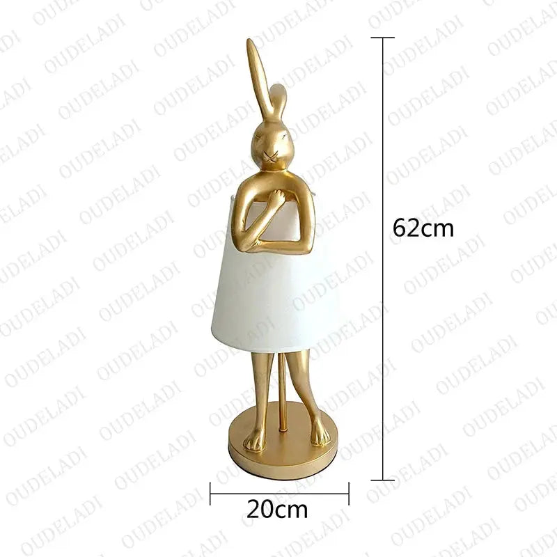Gold and white decorative statue with dimensions on a white background