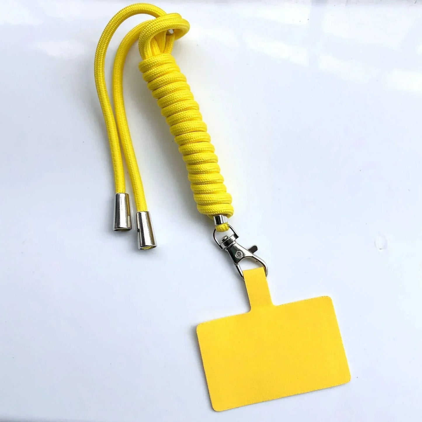 Yellow lanyard with a detachable card holder on a white background