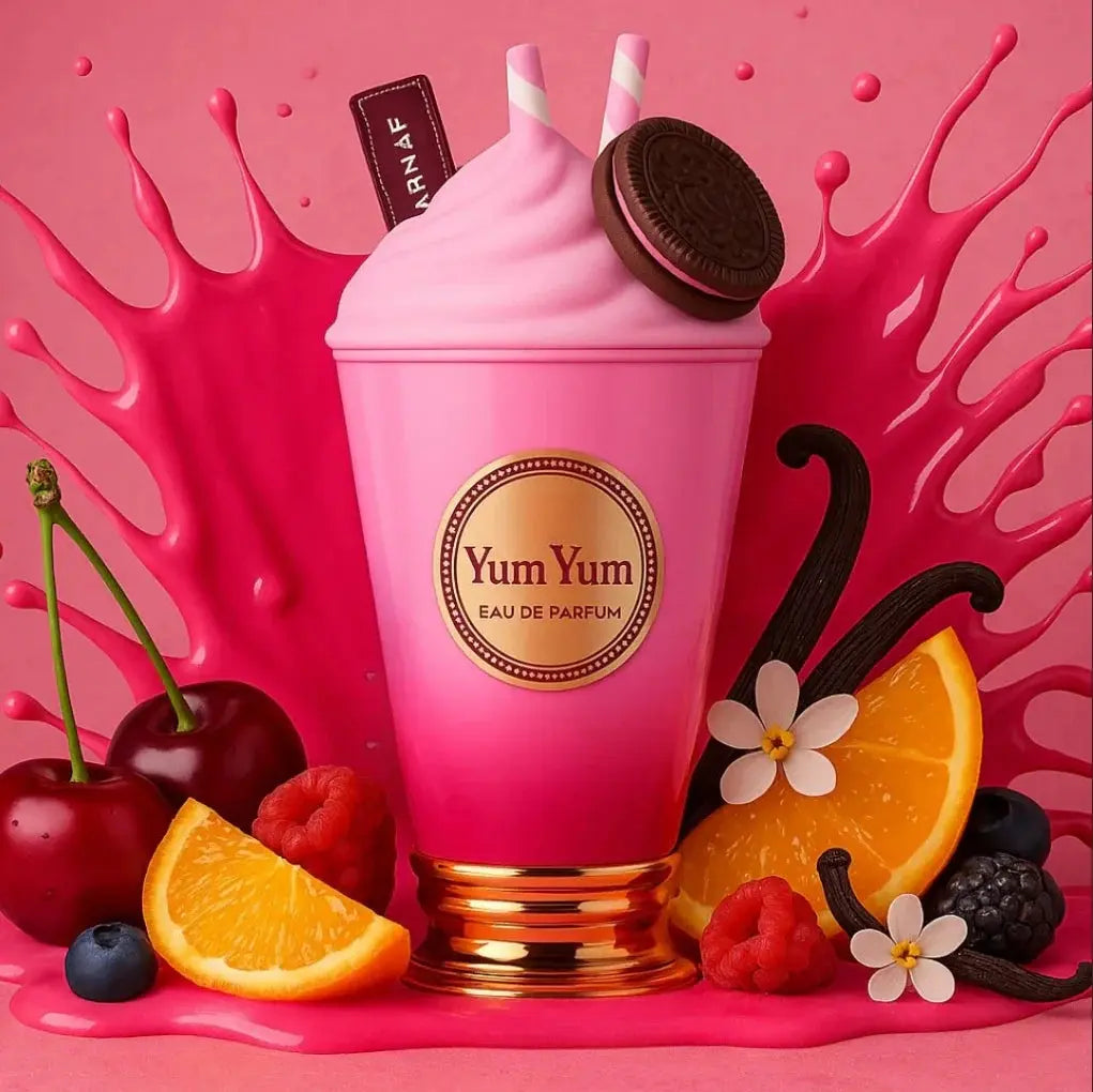 Pink 'Yum Yum' parfum bottle with vanilla bean, cherry, orange, and raspberry on a pink background