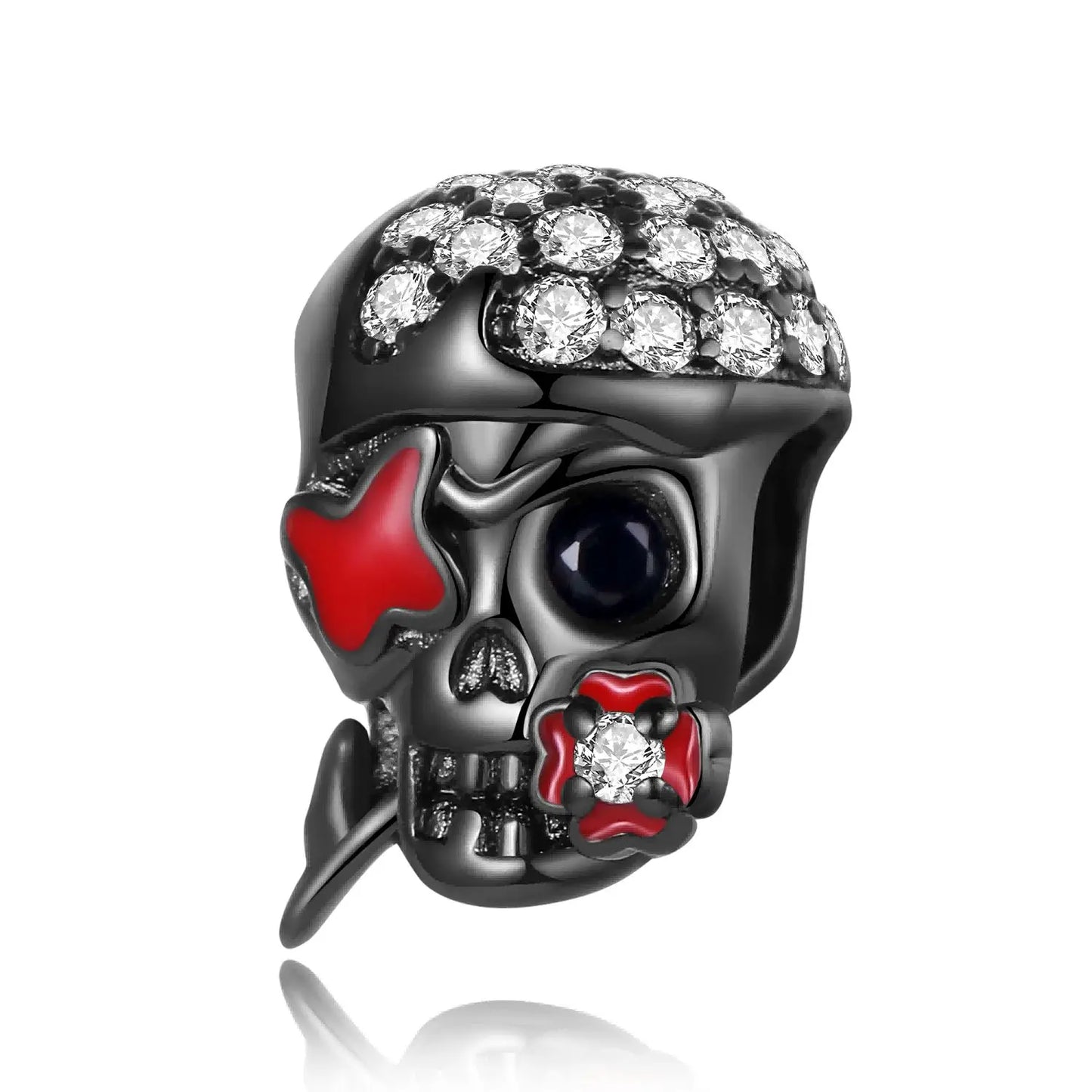Skull-shaped jewellery piece biting on a red rose and a red eye patch with diamond-like stones on top of the skull on a white background. pandora style charm pendant. Gothic Style, Halloween theme.