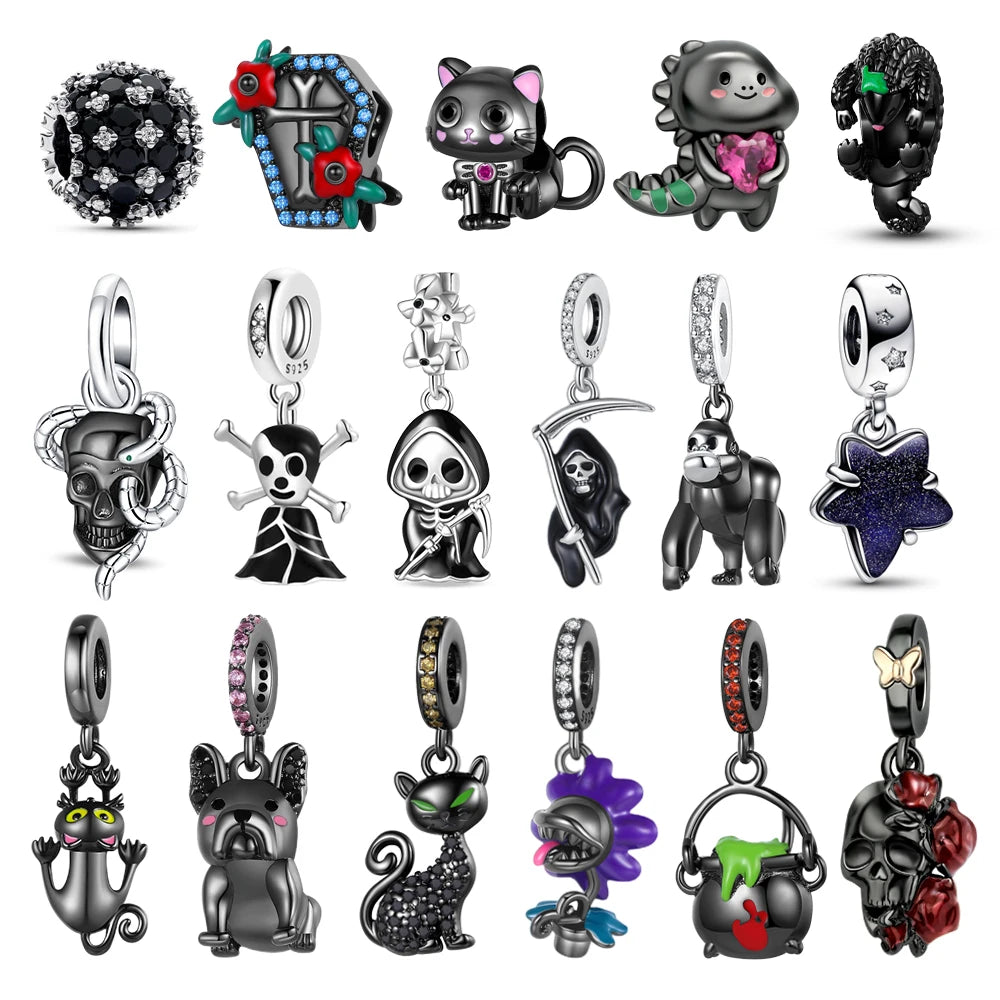Collection of various black and silver charms on a white pandora style charm pendant background