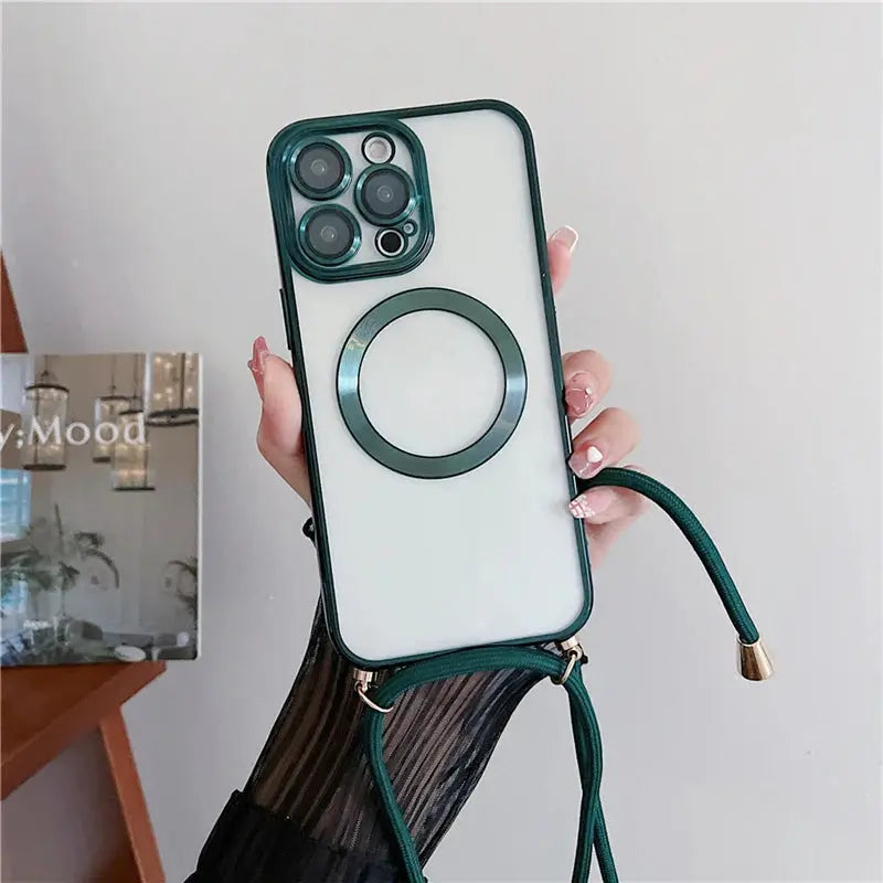 Phone case with green strap held by a hand against a neutral background