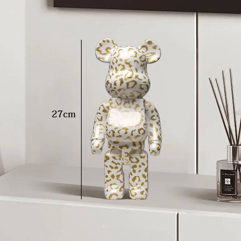 Leopard print bear-shaped decorative item on a white surface with a measurement label be@rbrick collectable
