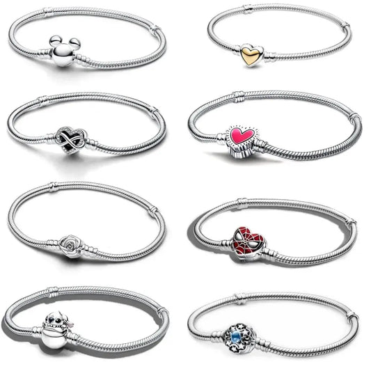 Disney Collection of silver bracelets with various charms on a white background
