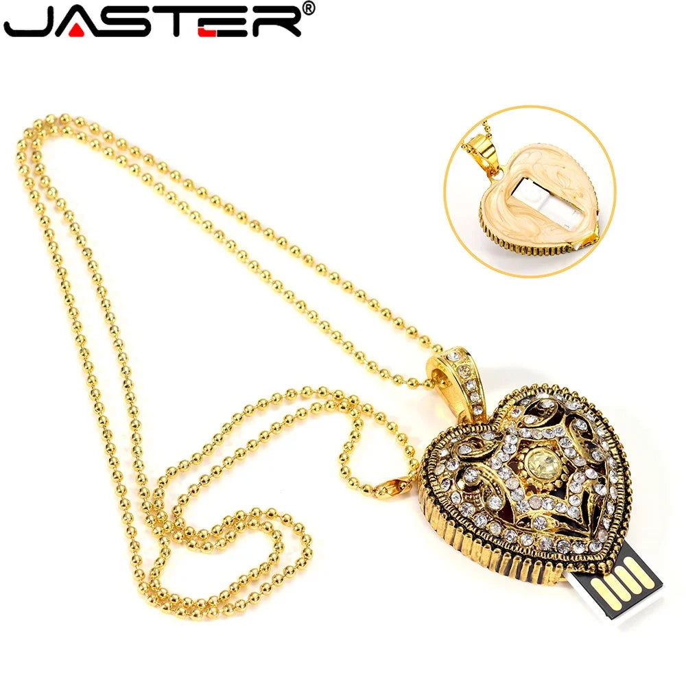 Gold heart-shaped USB drive necklace with JASTER branding on a white background