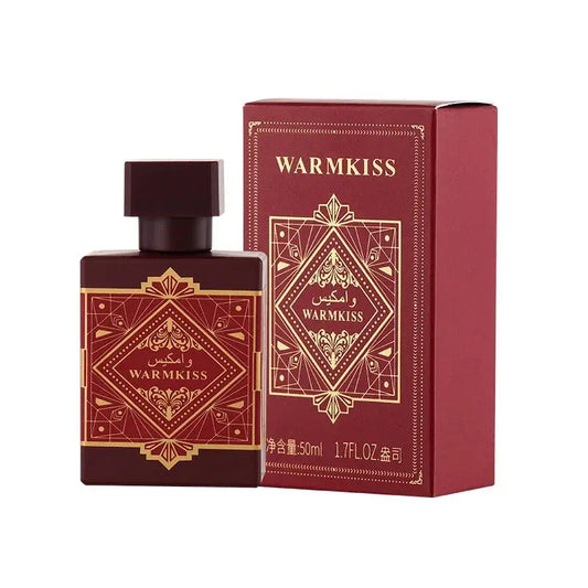 Red and gold perfume bottle and packaging with 'WARMKISS' branding on a white background