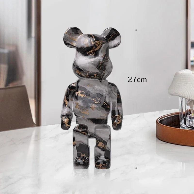 Gray and gold marble-patterned bear figure on a white surface with a measurement label indicating 27cm. be@rbrick collectable