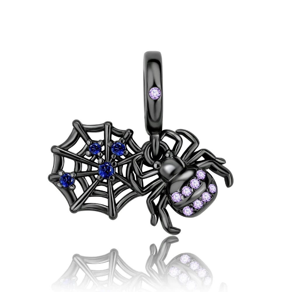 Black spider and web charm with purple and blue gemstones on a white background pandora style charm pendant halloween gothic