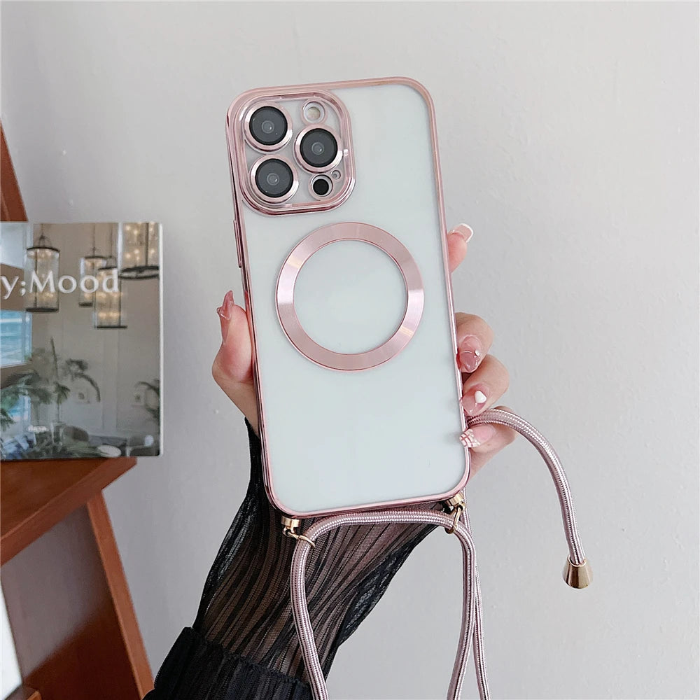 Phone case with a strap held by a hand, with a blurred indoor background