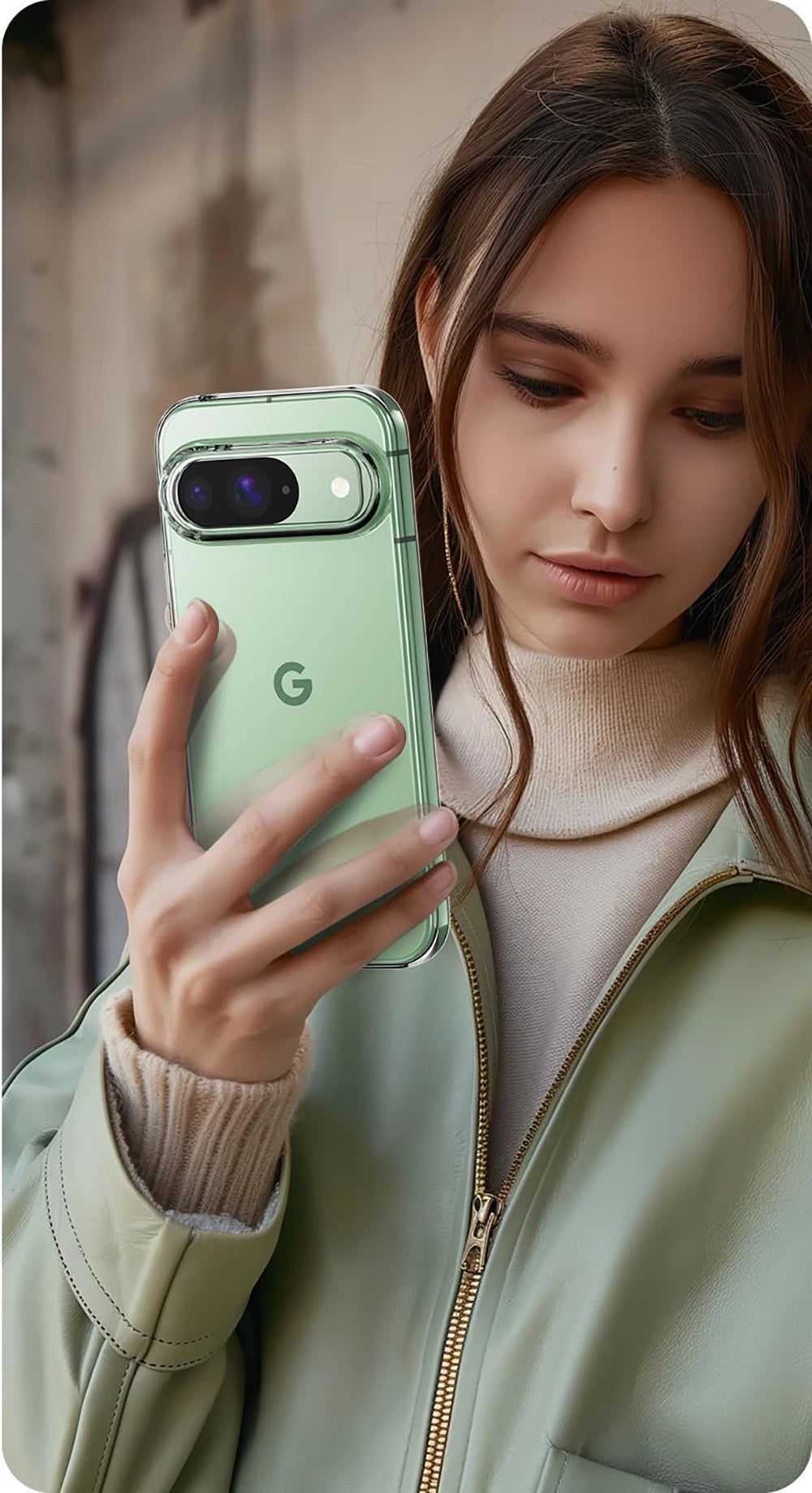 Woman holding a green smartphone with a visible 'G' logo.