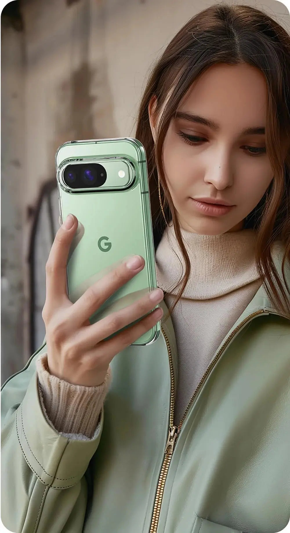 Woman holding a green smartphone with a visible 'G' logo.