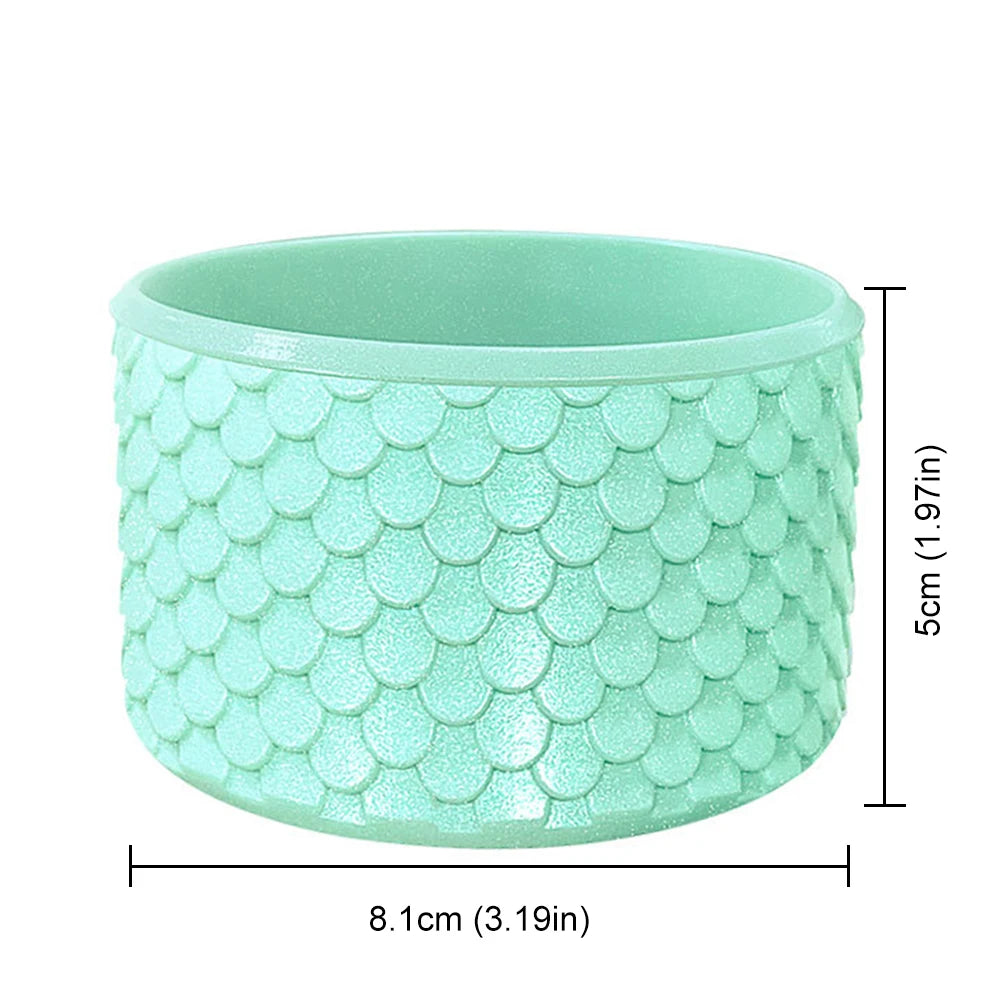 Stanley Green ceramic planter with fish scale pattern and dimensions on a white background
