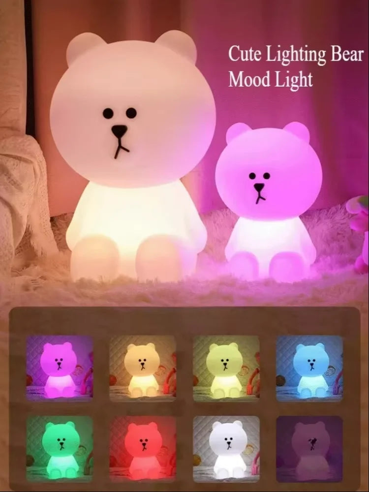 Cute bear-shaped lighting device with color-changing options on a soft background.