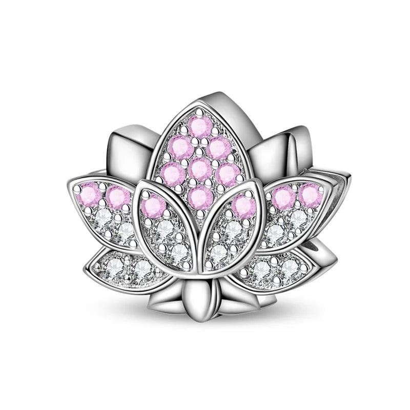 Silver lotus flower charm with pink gemstones on a white background