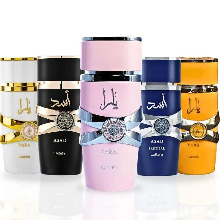 Collection of colorful perfume bottles with brand names on a white background