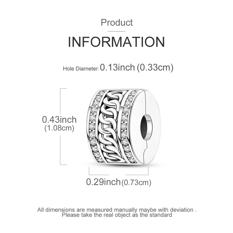 Silver charm with measurements on a white background
