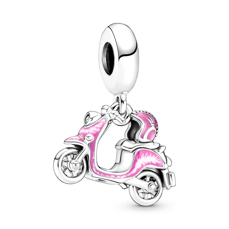 Silver charm shaped like a scooter with pink details on a white pandora stylebackground