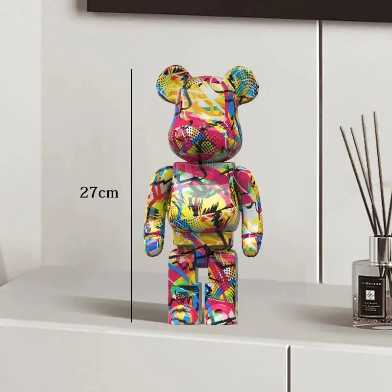Colorful bear-like figure with measurement label on a white surface be@rbrick collectable