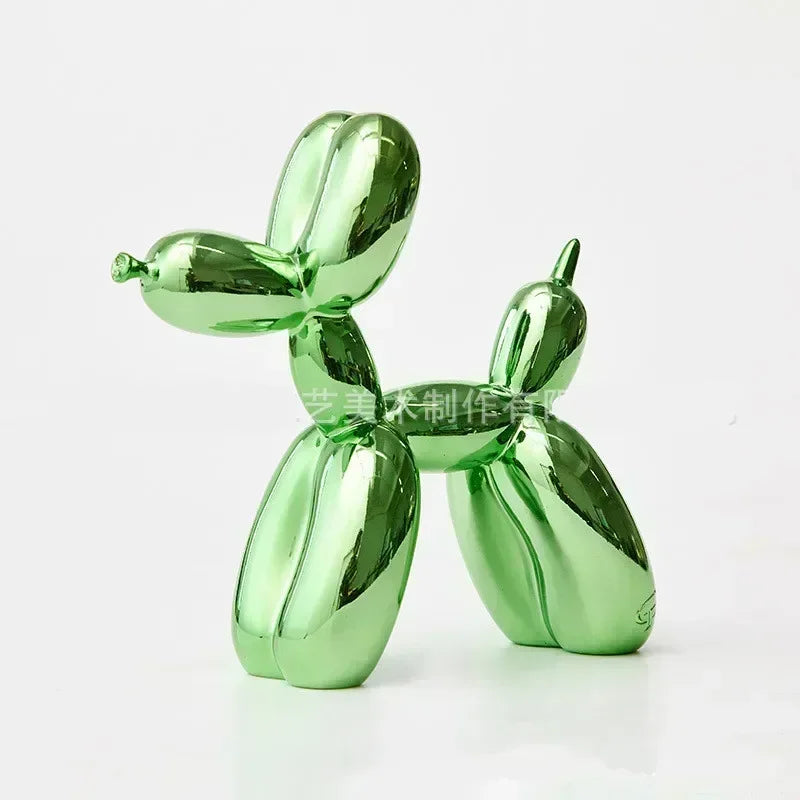 Shiny green balloon dog sculpture on a white background