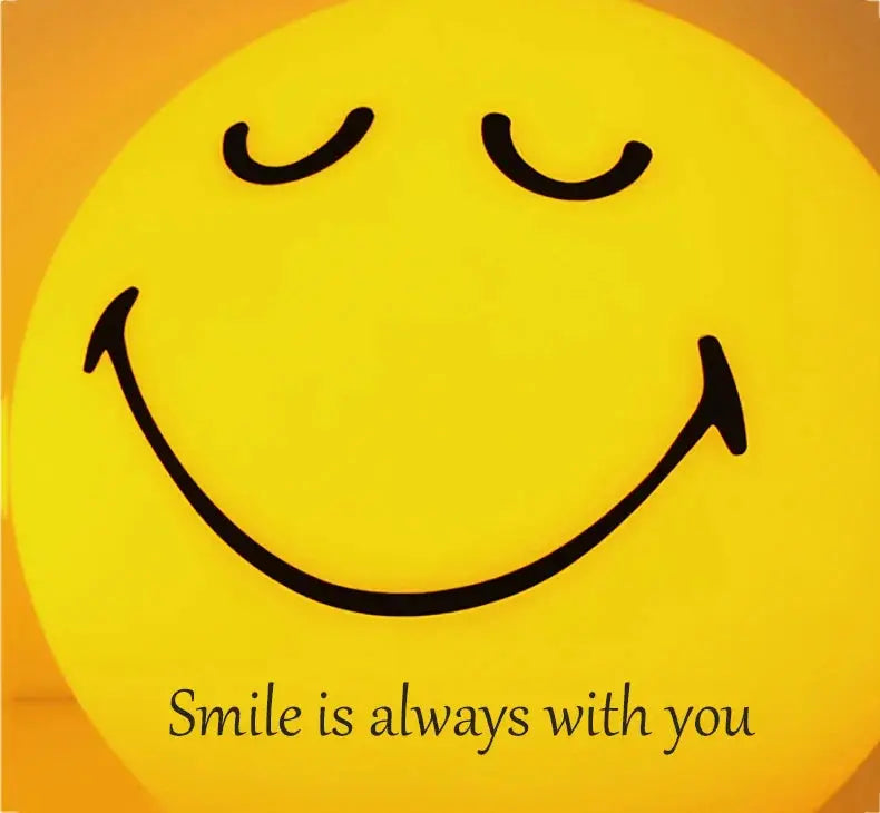 Smiley face with 'Smile is always with you' text on a yellow and orange gradient background