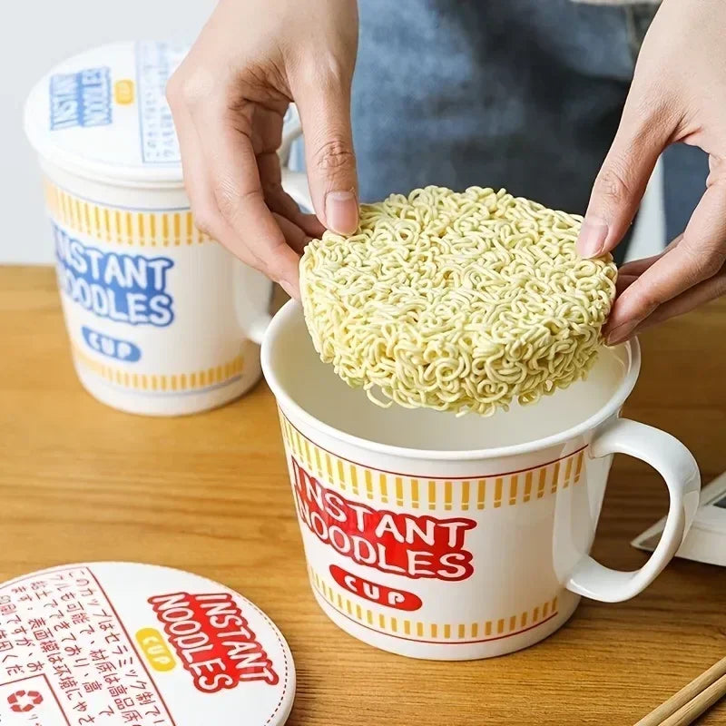 Hand placing dry instant noodles into large ceramic bowl with red design. Great for quick meals and heat retention.