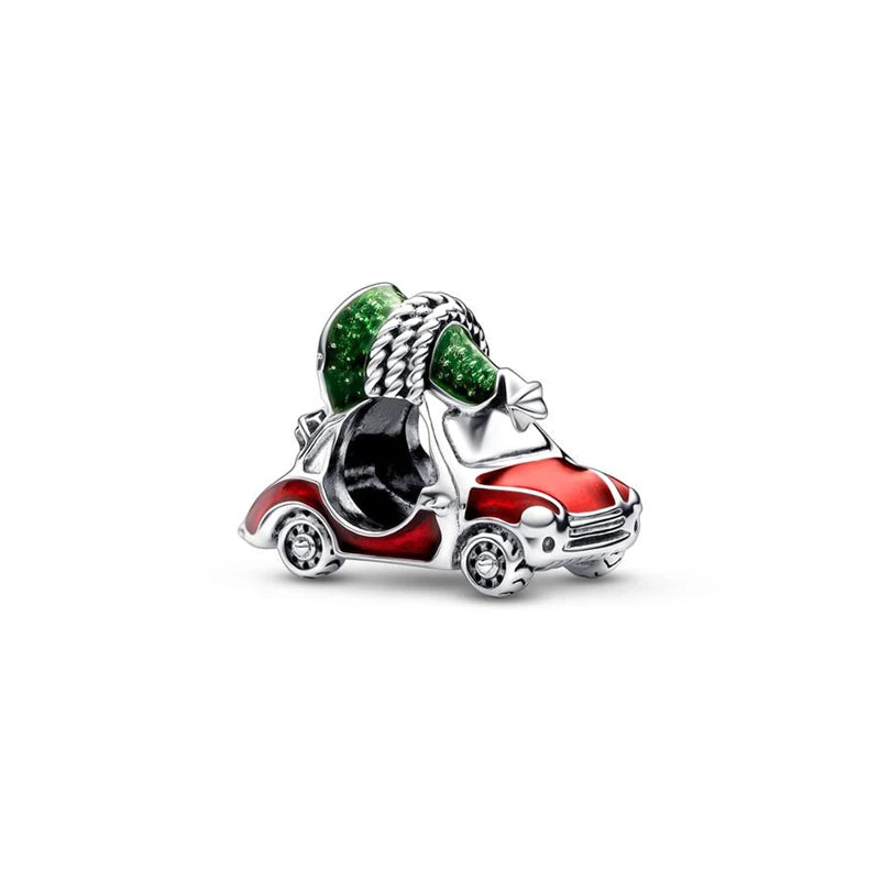 Car-shaped charm with green gemstones on a white background pandora style