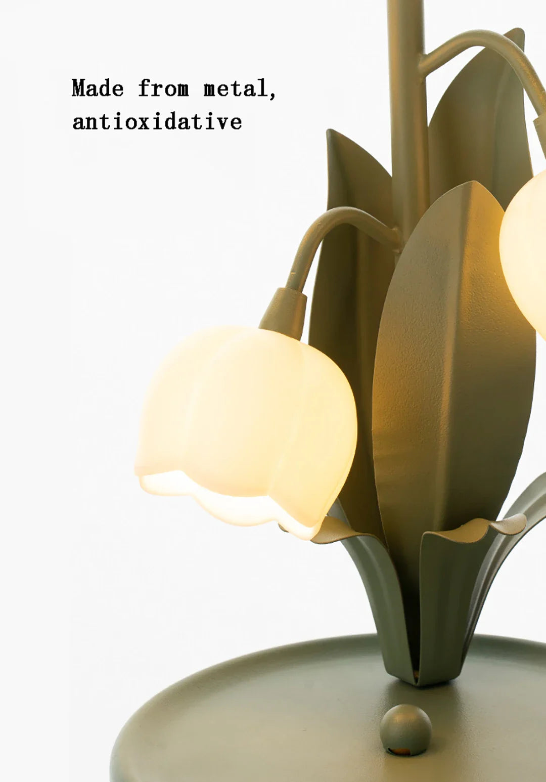 Decorative lamp with metal and glass design on a white background