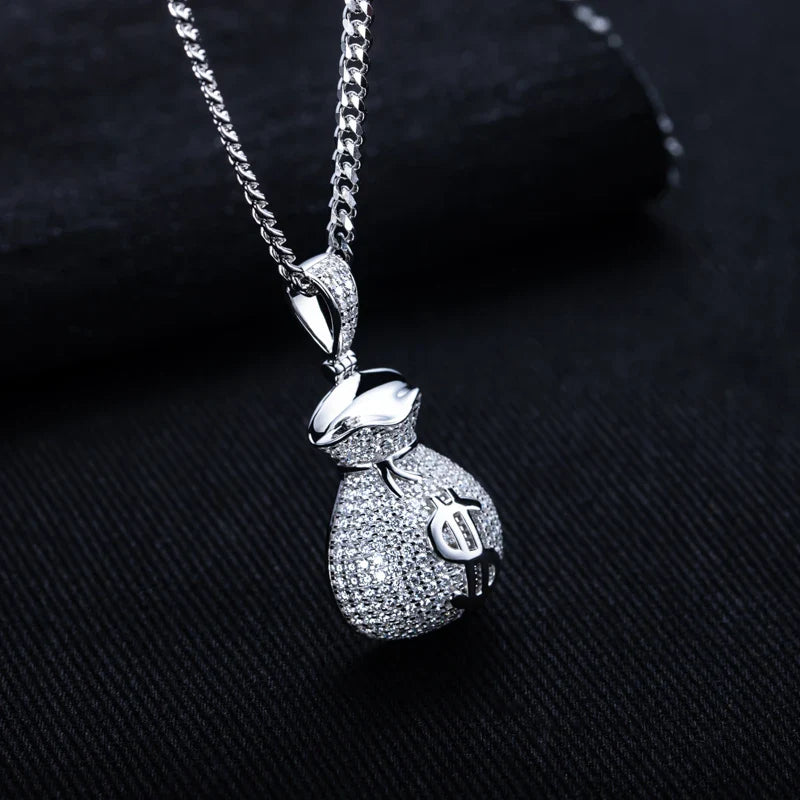 Silver pendant necklace on a dark textured background