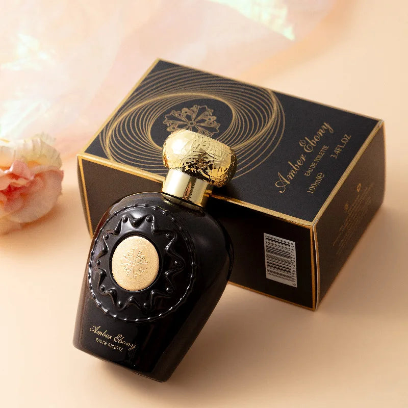 Amber Evening perfume bottle and packaging on a soft background