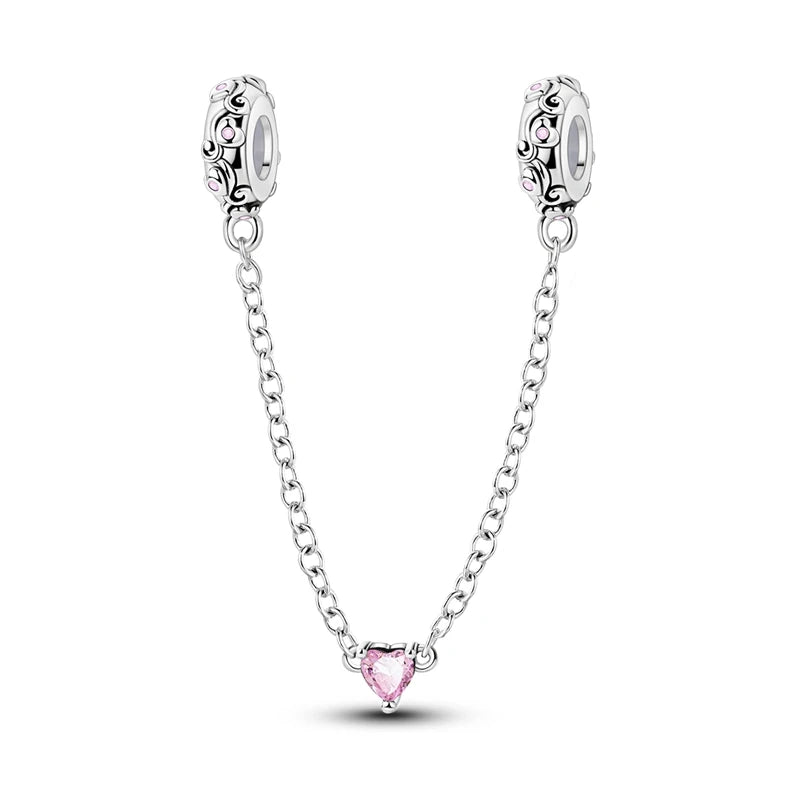 Silver necklace with a pink heart pendant on a white background