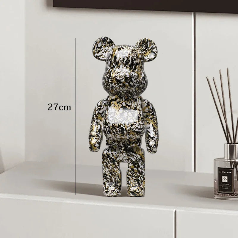 Metallic bear figure on a white surface with dimensions indicated be@rbrick collectable