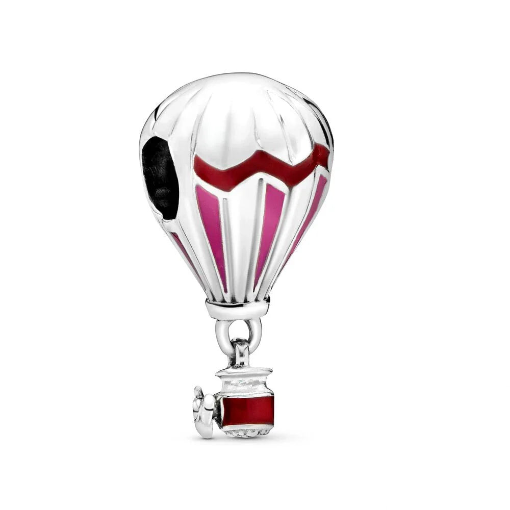 Silver charm shaped like a hot air balloon with red and pink stripes on a white background