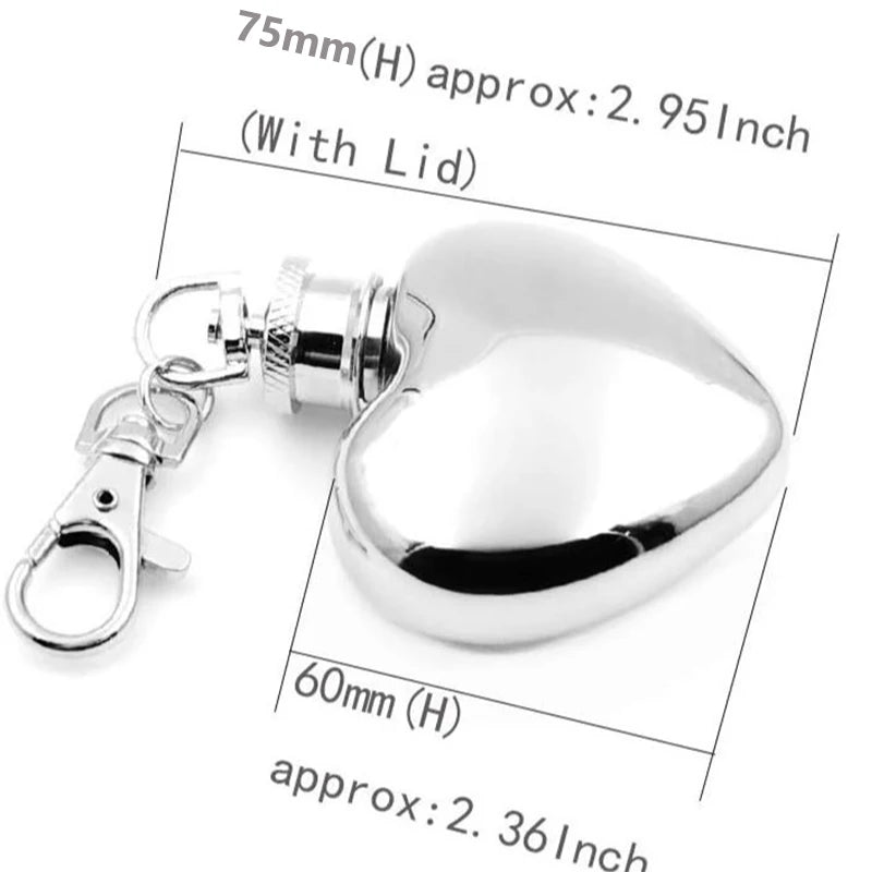 Heart-shaped silver keychain with measurements on a white background