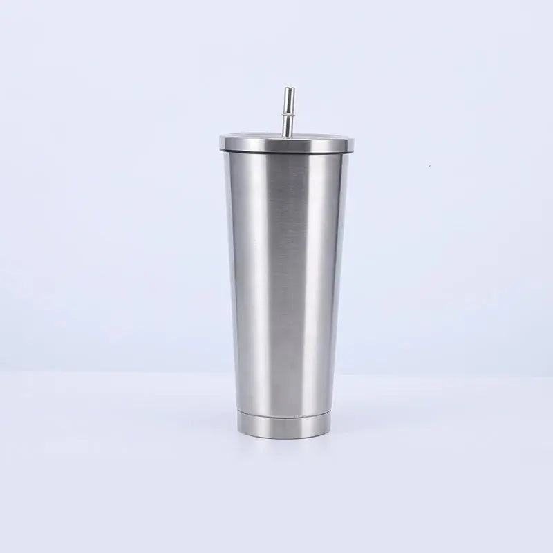 Stainless steel tumbler with a straw on a white background