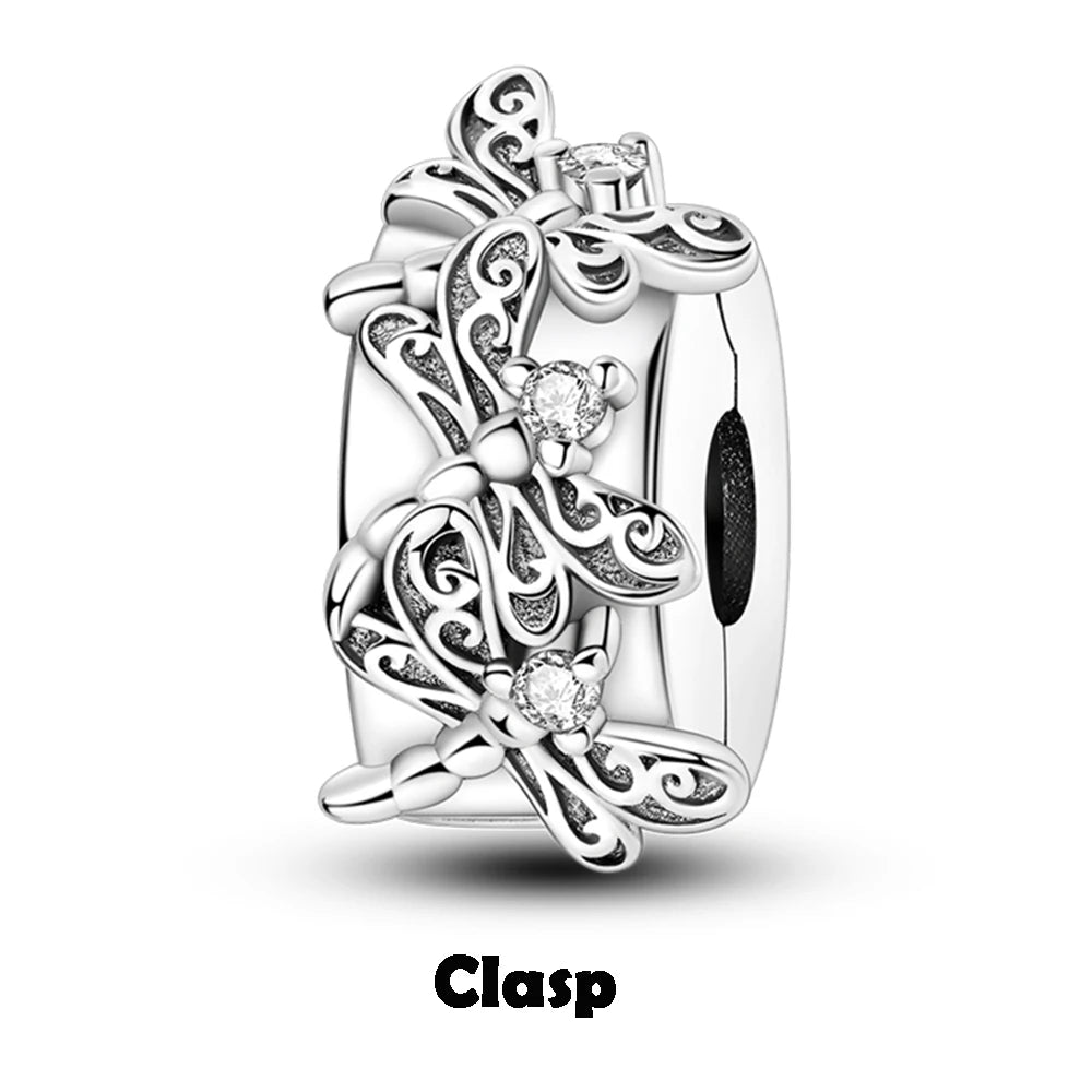 Silver clasp with butterfly design and clear gemstones on a white background