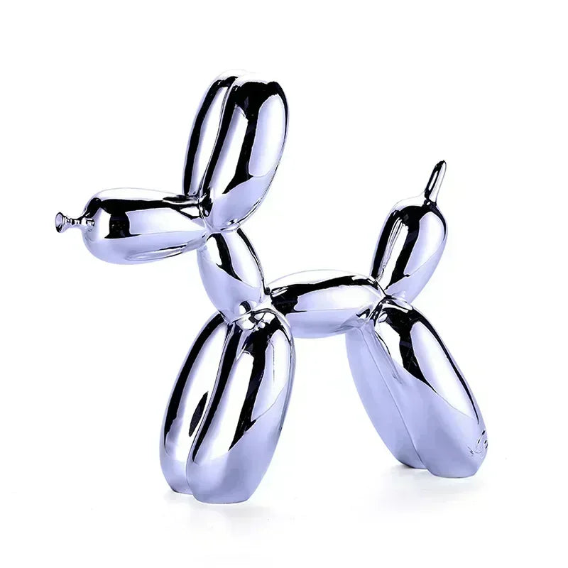 Metallic balloon dog sculpture on a white background