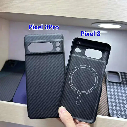 Two phone cases, one labeled 'Pixel 8Pro' and the other 'Pixel 8', held against a blurred background.