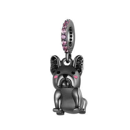 Dog-shaped charm with pink gemstones on a white background. pandora style charm pendant. Bulldog 