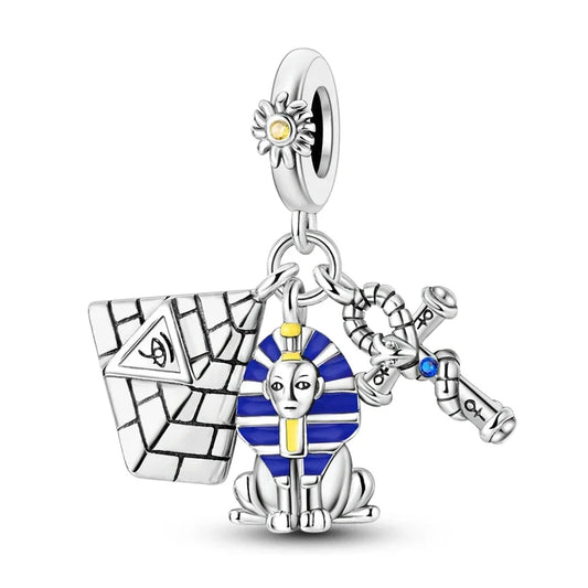 Silver charm with Egyptian-themed design on a white background