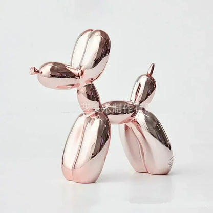 Rose gold balloon dog sculpture on a white background