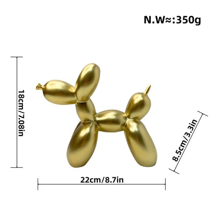 Gold balloon dog sculpture with measurements on a white background