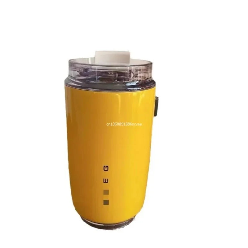 SMEG Yellow kitchen appliance with a clear top on a white background
