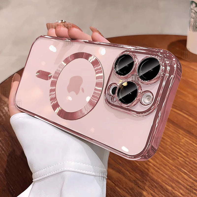 Phone case with rose gold accents held by a person on a wooden surface