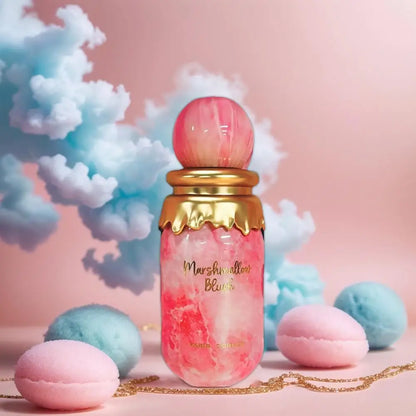 Pink and gold bottle with marshmallow design on a pink background with clouds and macarons.